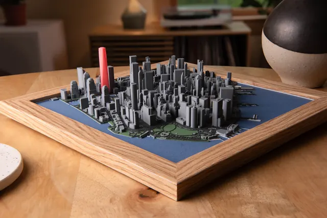 A 3D printed map of Lower Manhattan in an oak frame
